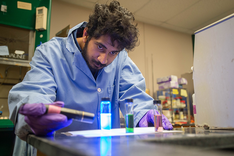 SIU chemistry student conducts experiment